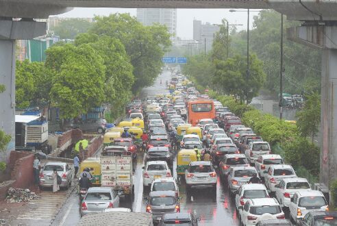Incessant rains inundate several  areas, Dwarka road swallows car