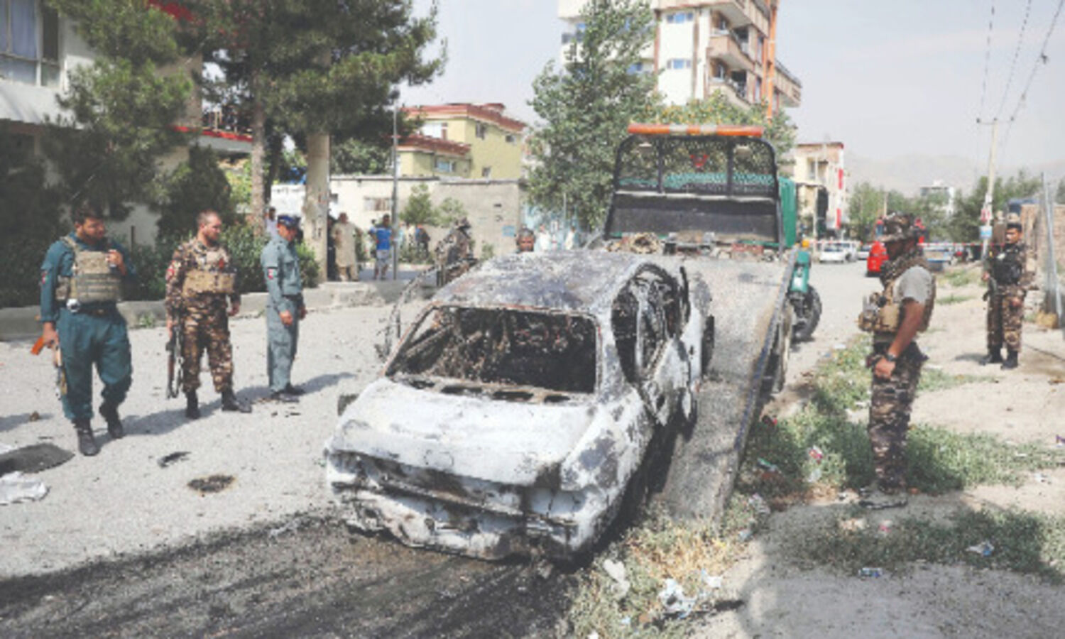 Afghan president slams Taliban; rockets target Kabul palace