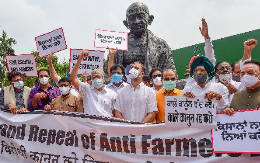 Cong MPs protest inside Parliament complex, demand repeal of new agri laws