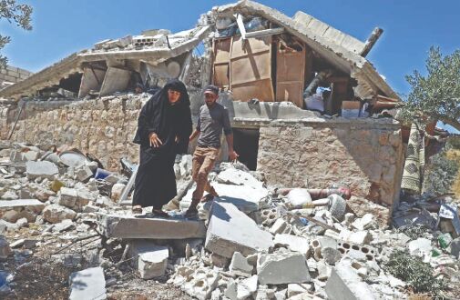 Syrian govt shells in rebel area kill 7 of same family