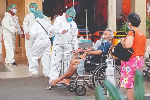 Death rates soar in South-East Asia as virus wave spreads