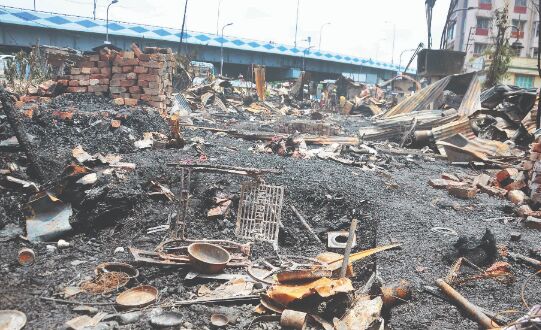 At least 35 shops gutted; eight, including 2 firefighters, injured