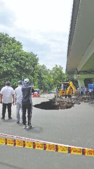 Another road caves in - this time under IIT flyover, traffic hit Another road caves in - this time under IIT flyover, traffic hit