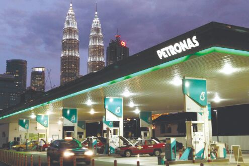 IOC may sell some petrol pumps to JV with Petronas
