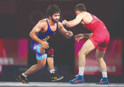 Wrestling: Bajrang to fight for bronze; Seema makes early exit Wrestling: Bajrang to fight for bronze; Seema makes early exit