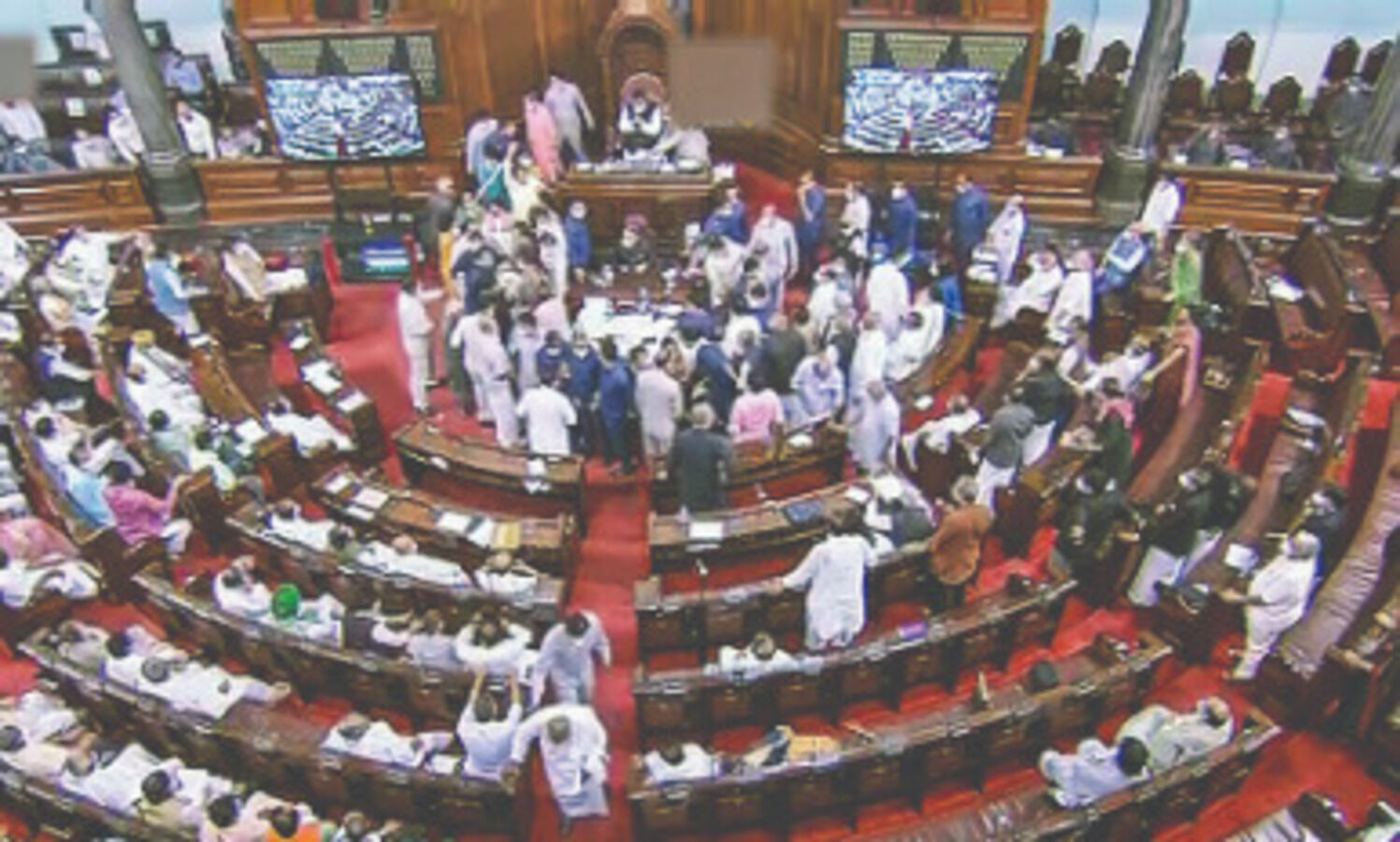 MPs tear papers, jostle with security staff in Rajya Sabha