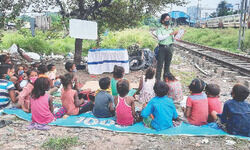 Traffic cops turn tutors for children in city slum Traffic cops turn tutors for children in city slum