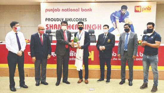 PNB honours Olympic medalist employee Shamsher Singh PNB honours Olympic medalist employee Shamsher Singh