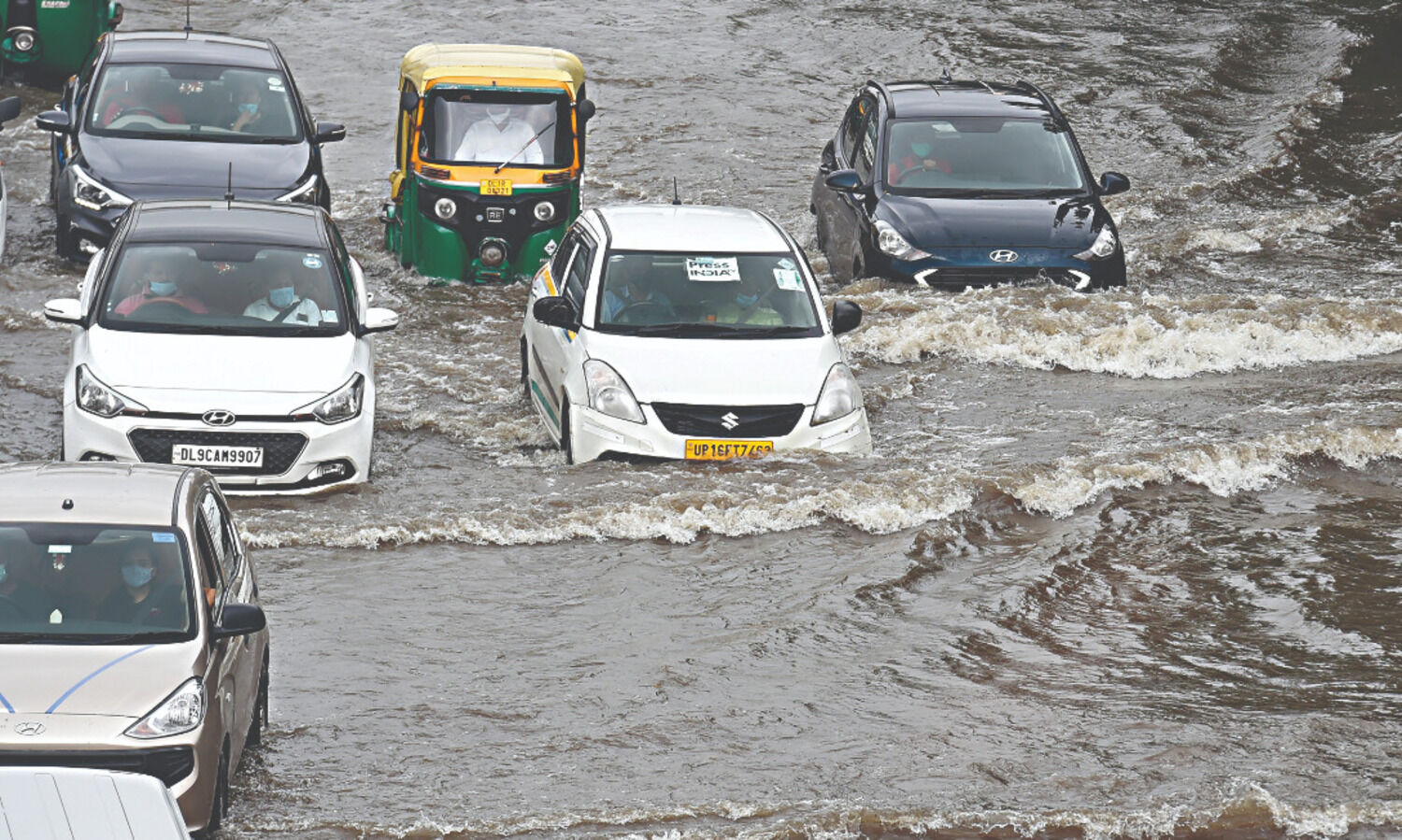 Roads waterlogged, traffic hit after record rains