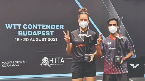 Manika Batra-Sathiyan bag   title as mixed doubles pair