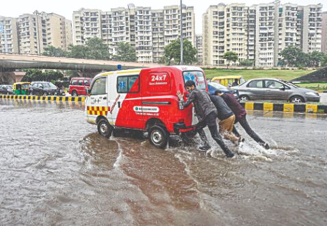 Rains bring city to its knees Rains bring city to its knees