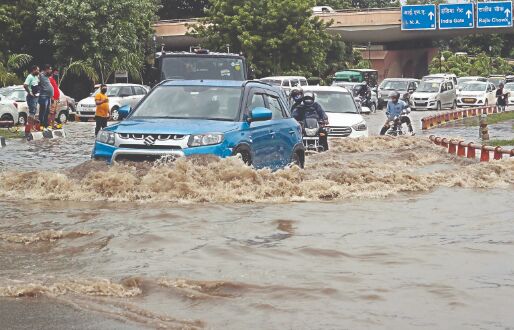 Record rains unleash chaos on waterlogged streets in Delhi