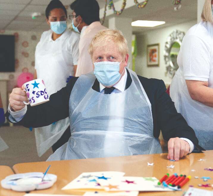 UK PM Johnson unveils new tax to fund health, social care costs UK PM Johnson unveils new tax to fund health, social care costs