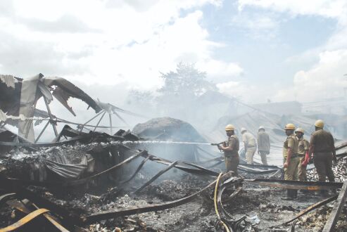 24 hours on, efforts underway to extinguish fire at warehouse 24 hours on, efforts underway to extinguish fire at warehouse