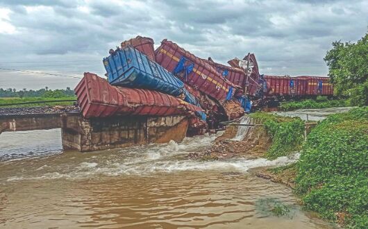 Goods train derails, falls into river in Odisha Goods train derails, falls into river in Odisha