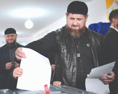 Putins party set to retain parliament majority after polls