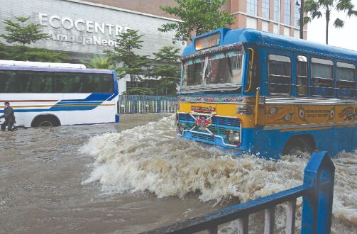 Rains: Waterlogging leads to traffic snarls at Biswa Bangla Sarani Rains: Waterlogging leads to traffic snarls at Biswa Bangla Sarani