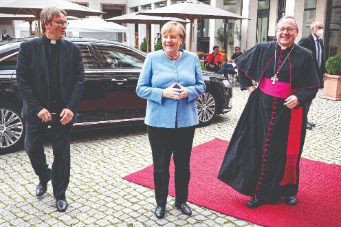 Chancellor Angela Merkel urges Germans: Keep working for democracy Chancellor Angela Merkel urges Germans: Keep working for democracy
