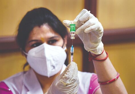 70% of Indias adult population given 1st dose of Covid vaccine 70% of Indias adult population given 1st dose of Covid vaccine