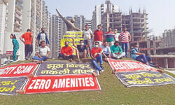 Residents across Noida, Gr Noida protest against builders for possession, registry Residents across Noida, Gr Noida protest against builders for possession, registry