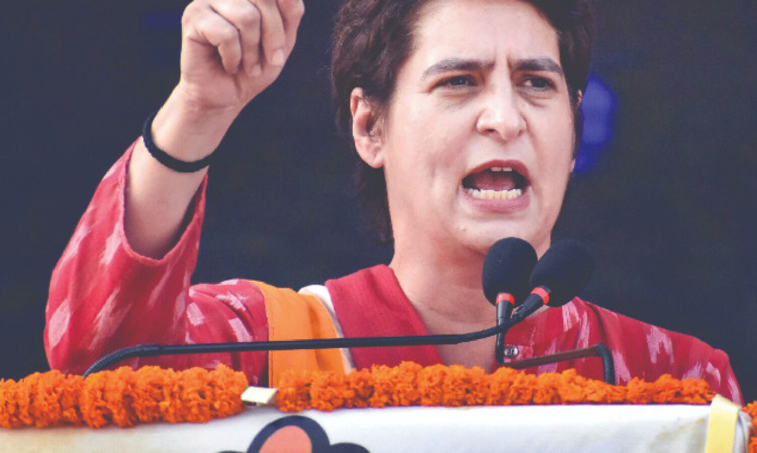 Congress promises free LPG cylinders, bus rides