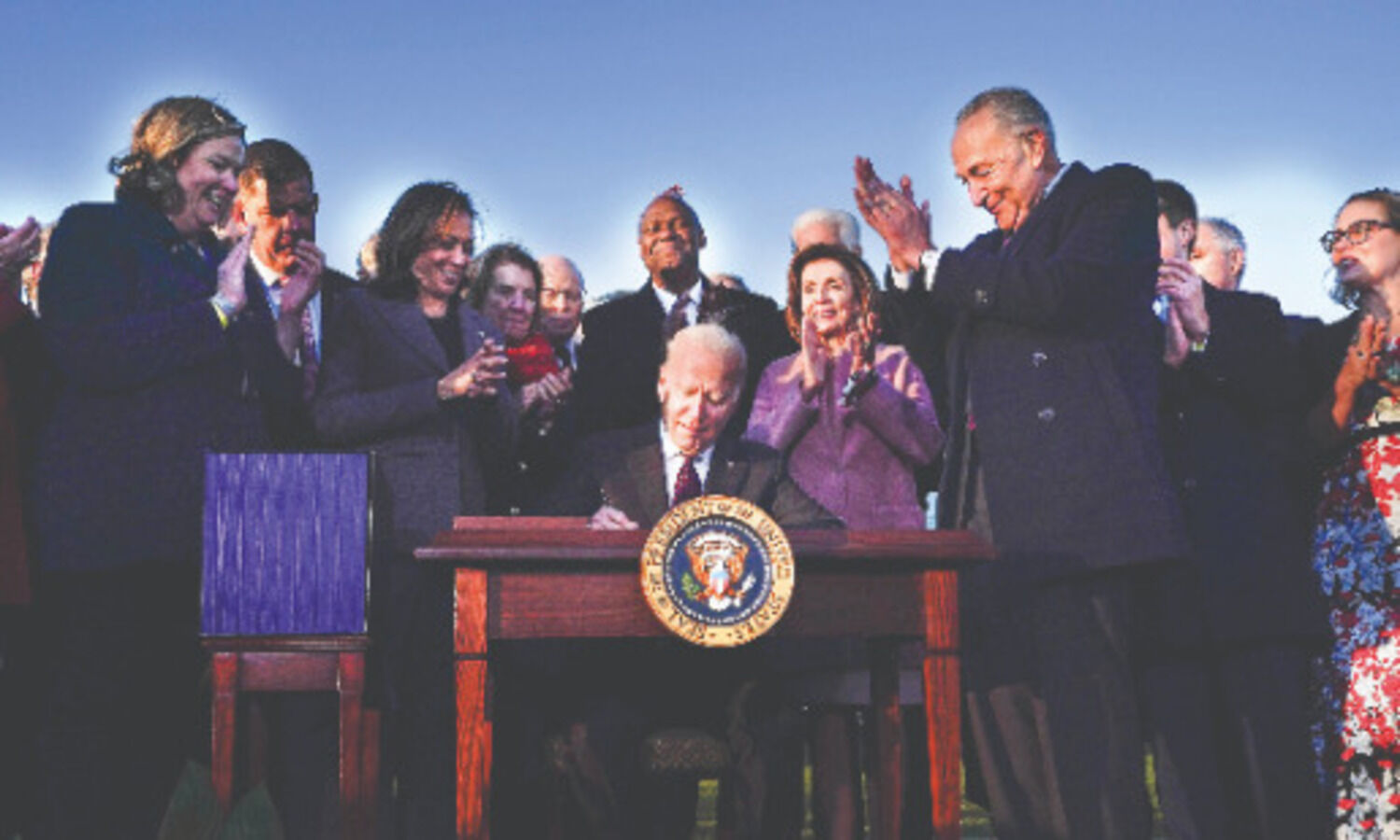 Biden signs $1 trillion infrastructure Bill with bipartisan audience