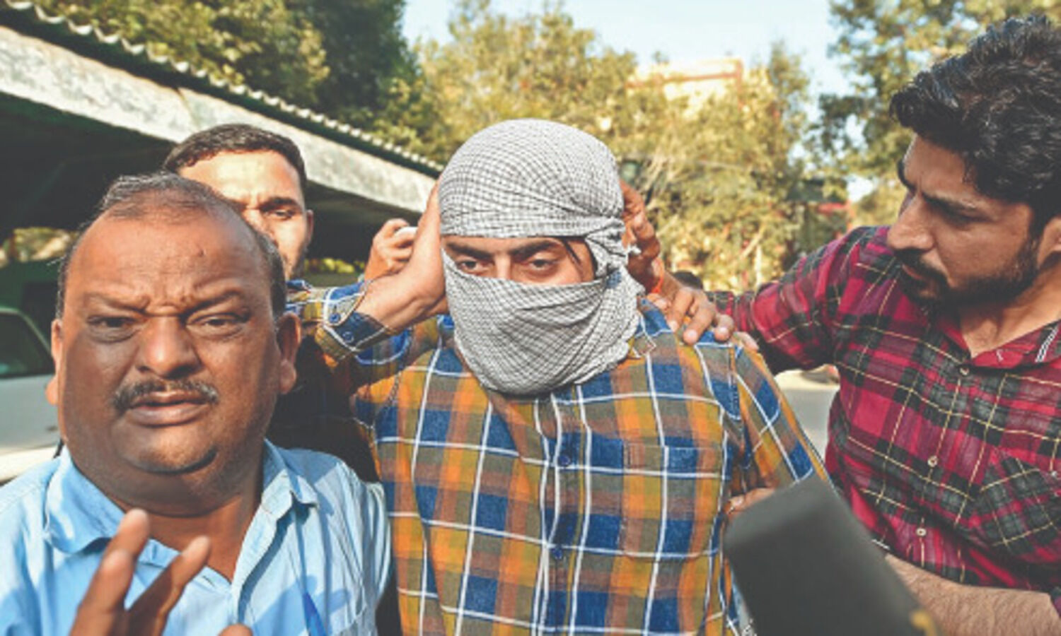 Delhi riots: No intention to kill but scare, says man who pointed gun at police