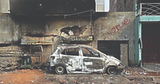 Delhi riots: Court calls for probe to see if cops were shielding accused