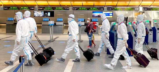 COVID variant spreads to more countries as world on alert