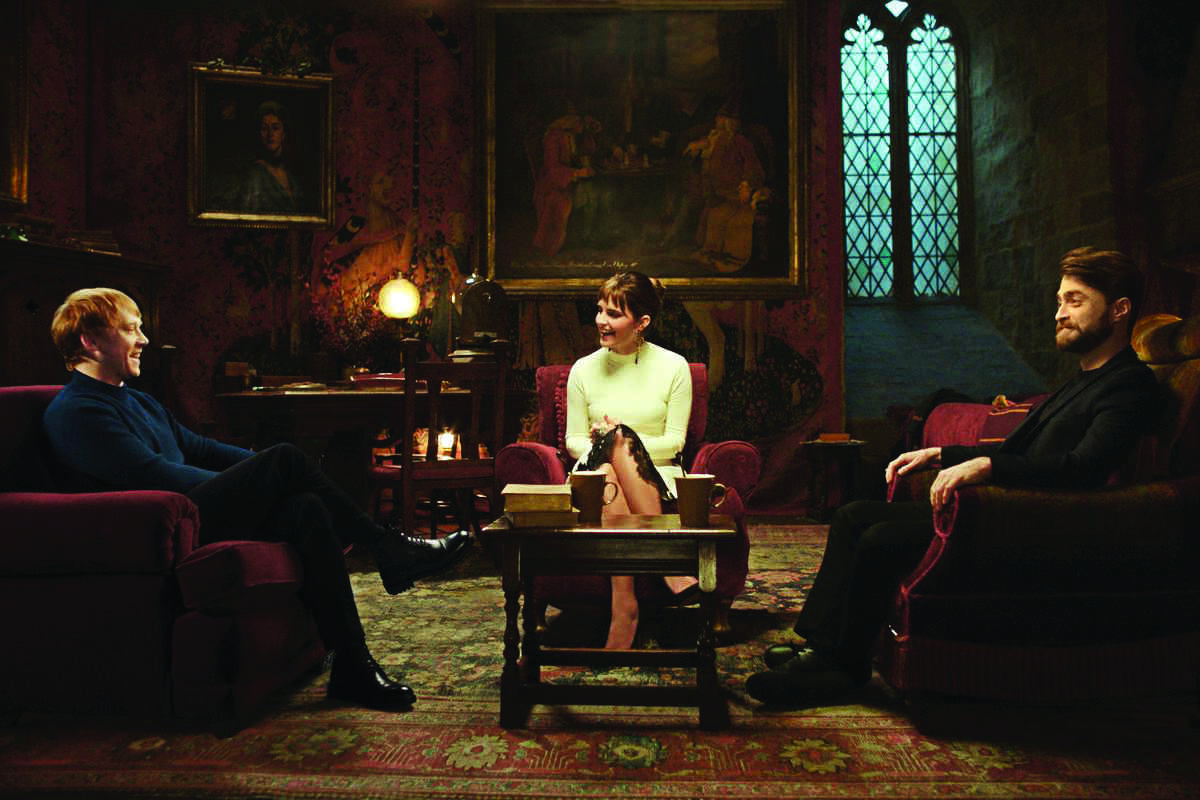 Daniel, Emma and Rupert engage in an animated conversation Daniel, Emma and Rupert engage in an animated conversation