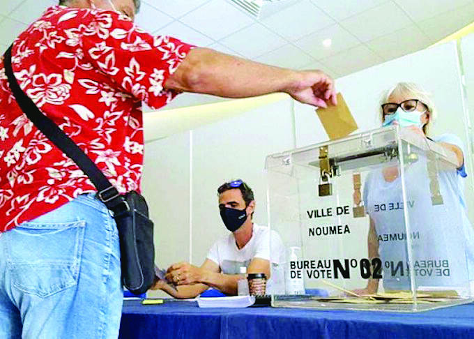 New Caledonia votes to stay in France; separatists boycott