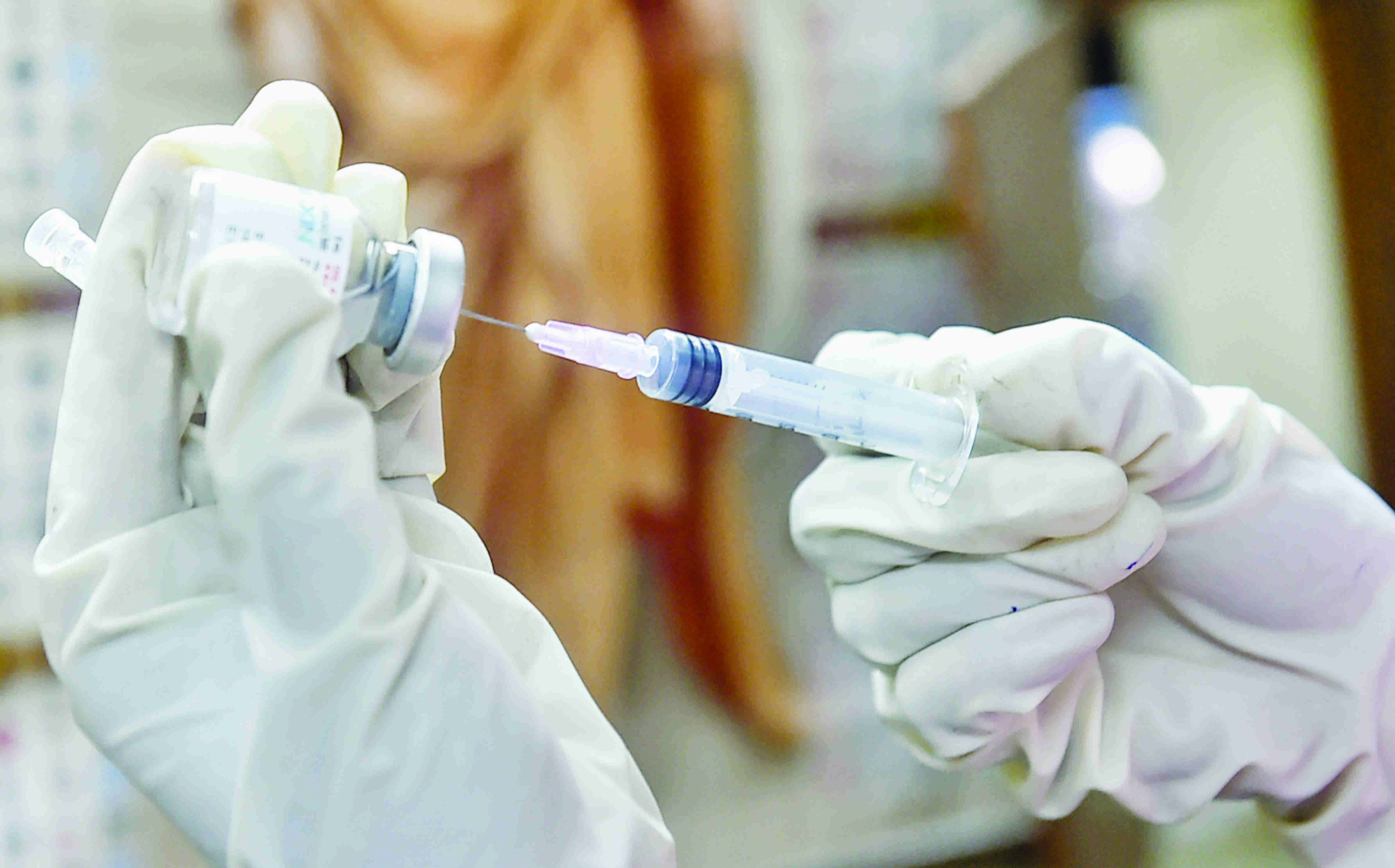 UK opens up Covid boosters to all over 30s in Omicron fight UK opens up Covid boosters to all over 30s in Omicron fight