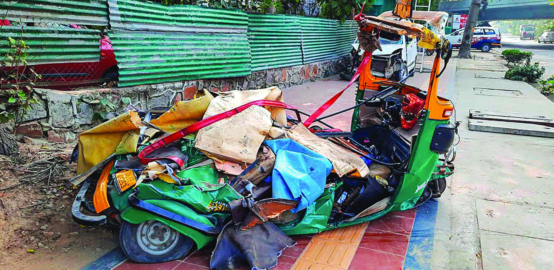 Four killed after container truck overturns, falls on autorickshaw