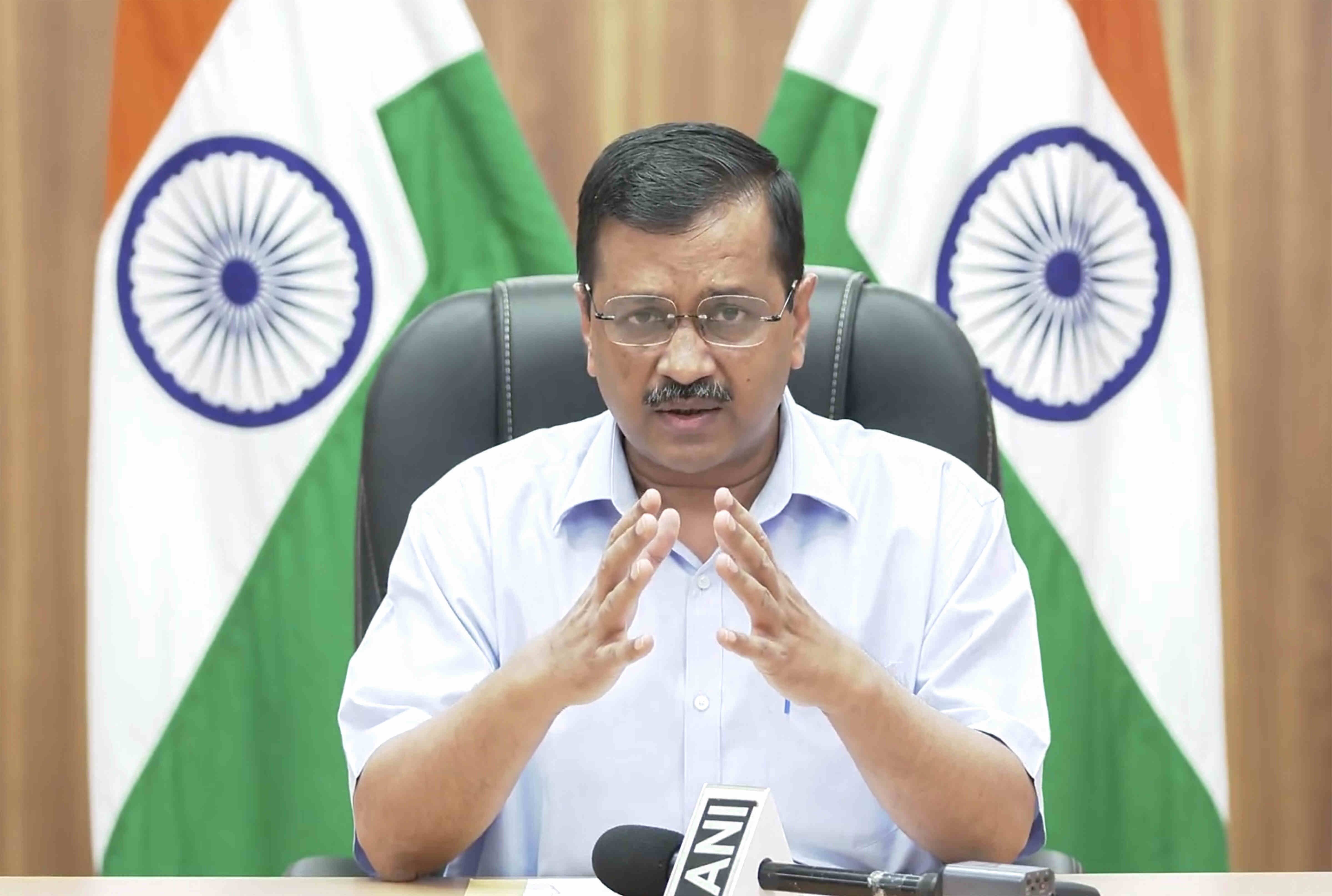 CM Kejriwal flags off DTCs first electric bus CM Kejriwal flags off DTCs first electric bus