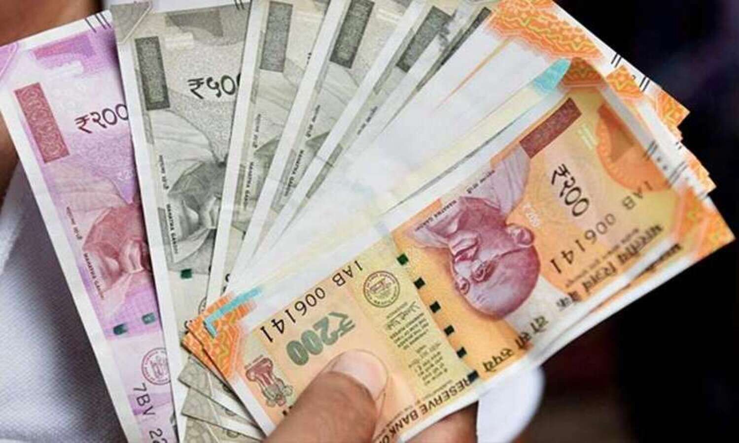 Rupee trades in a narrow range in early session against US dollar