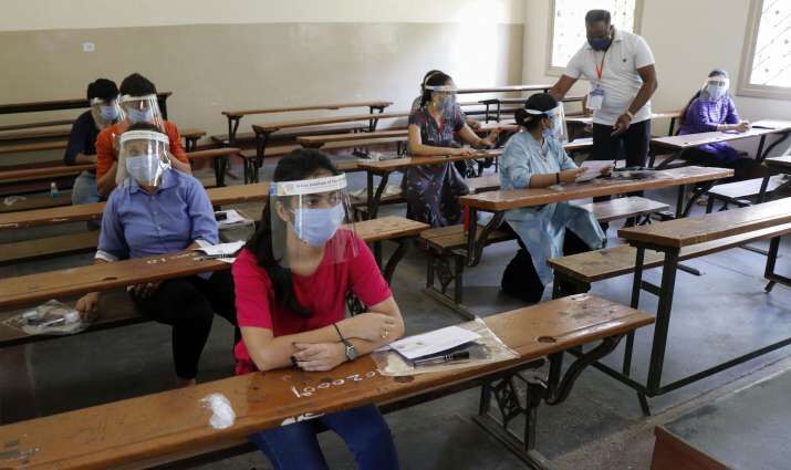 First semester students attend offline classes as colleges reopen First semester students attend offline classes as colleges reopen