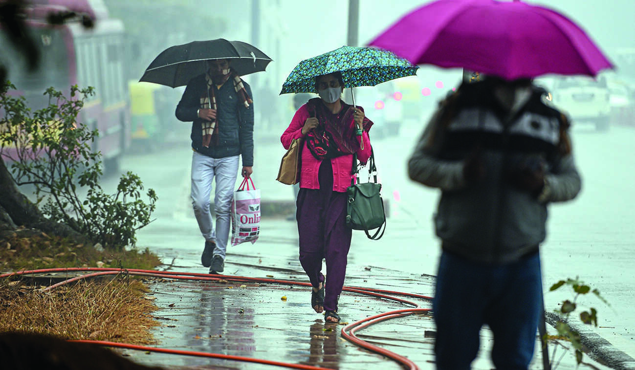 After overnight rains in parts of Delhi, max temp slightly down to 21.8 deg C After overnight rains in parts of Delhi, max temp slightly down to 21.8 deg C
