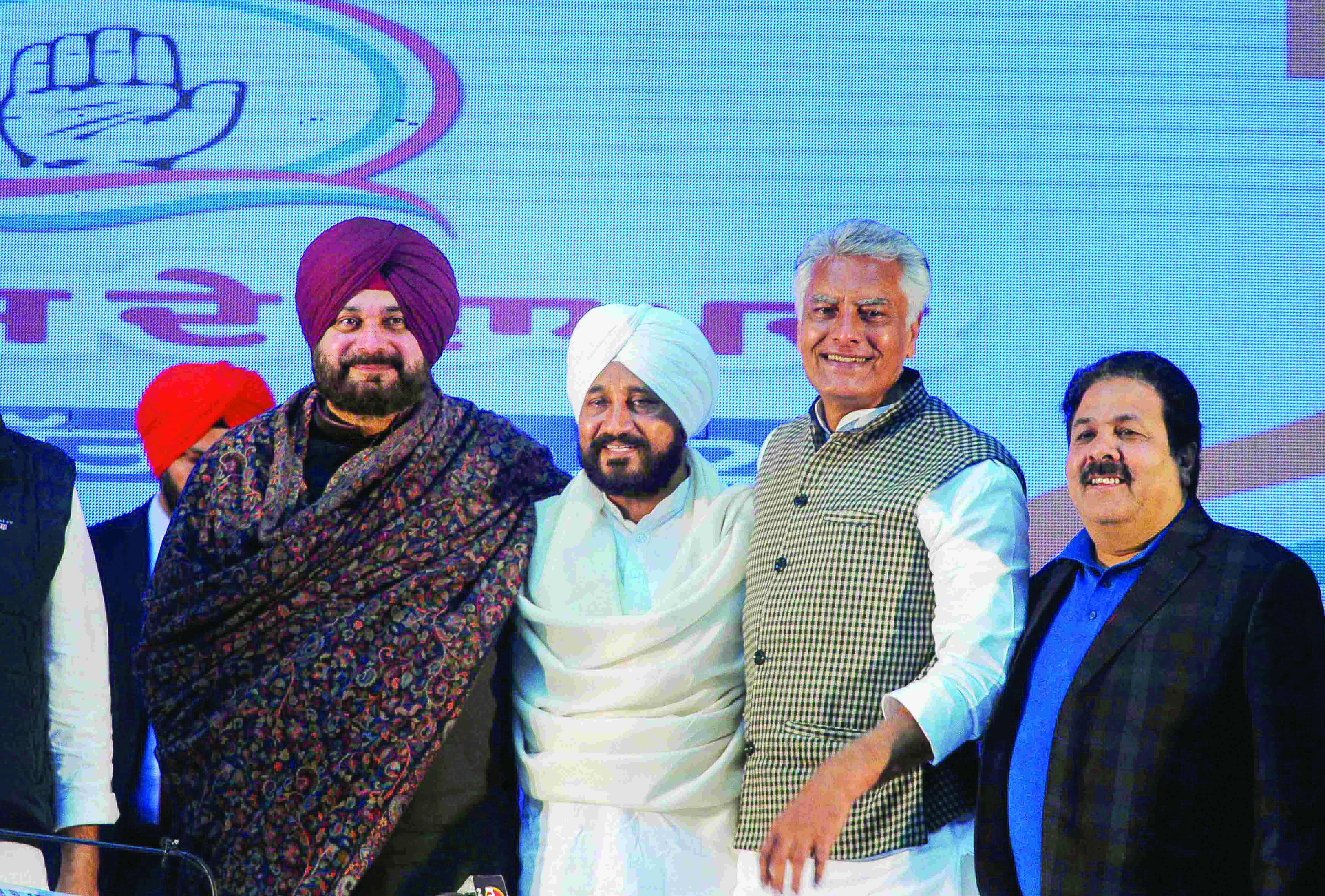 Promises galore in much-delayed manifesto released by Congress Promises galore in much-delayed manifesto released by Congress