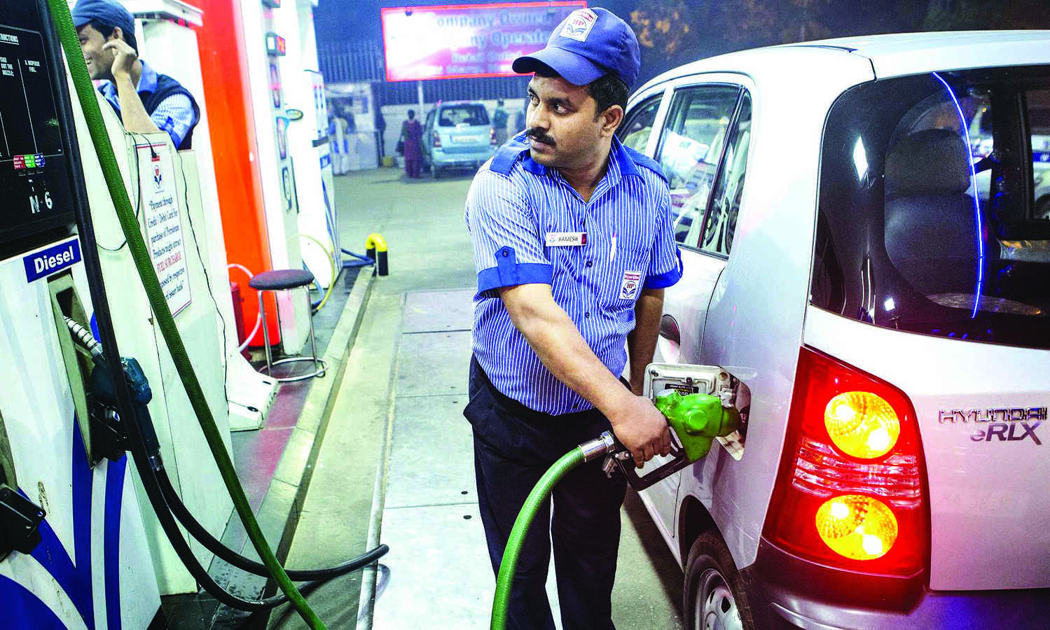 Crude falls below $100, eases pressure on oil cos