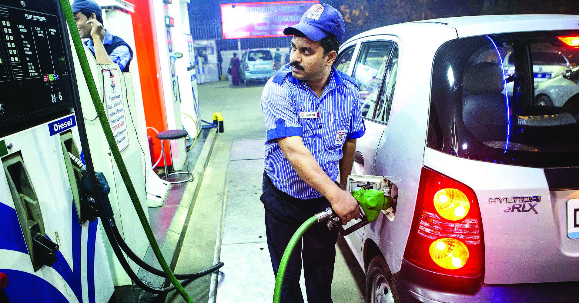Crude falls below $100, eases pressure on oil cos