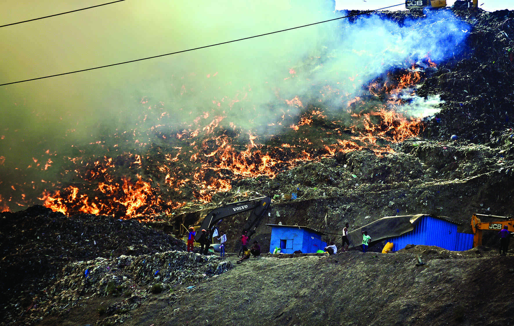 Ghazipur on fire for over 24 hours, firefighters unable to reach heights Ghazipur on fire for over 24 hours, firefighters unable to reach heights