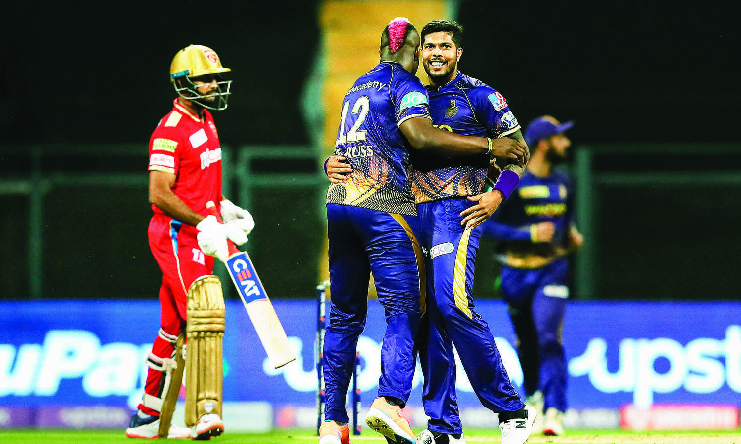 Umesh, Russell fire KKR to big win over PBKS
