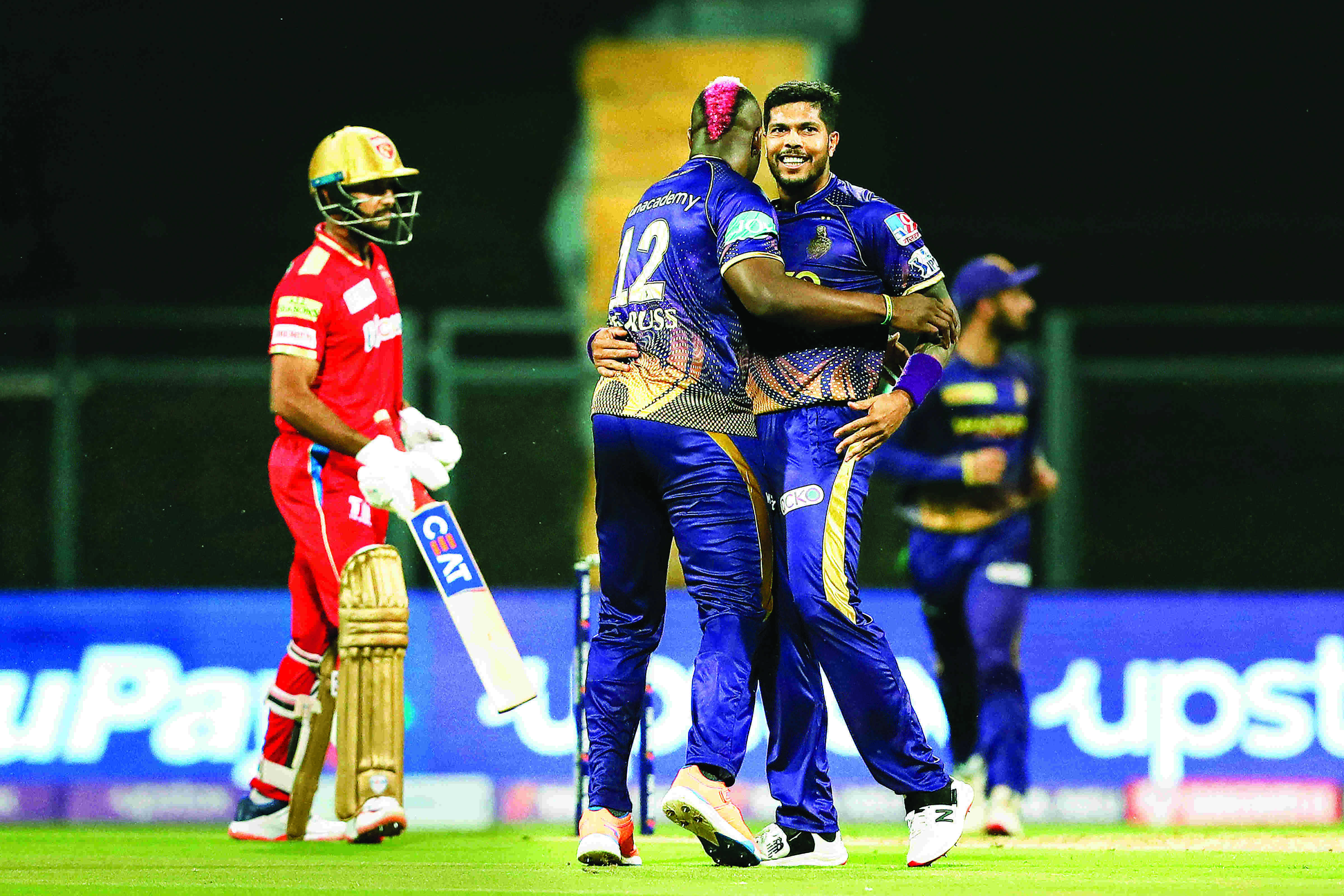 Umesh, Russell fire KKR to big win over PBKS
