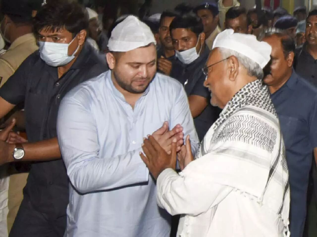 Nitish received by Tejashwi, Rabri at RJD leaders Iftar, greeted by Chirag who touches his feet Nitish received by Tejashwi, Rabri at RJD leaders Iftar, greeted by Chirag who touches his feet