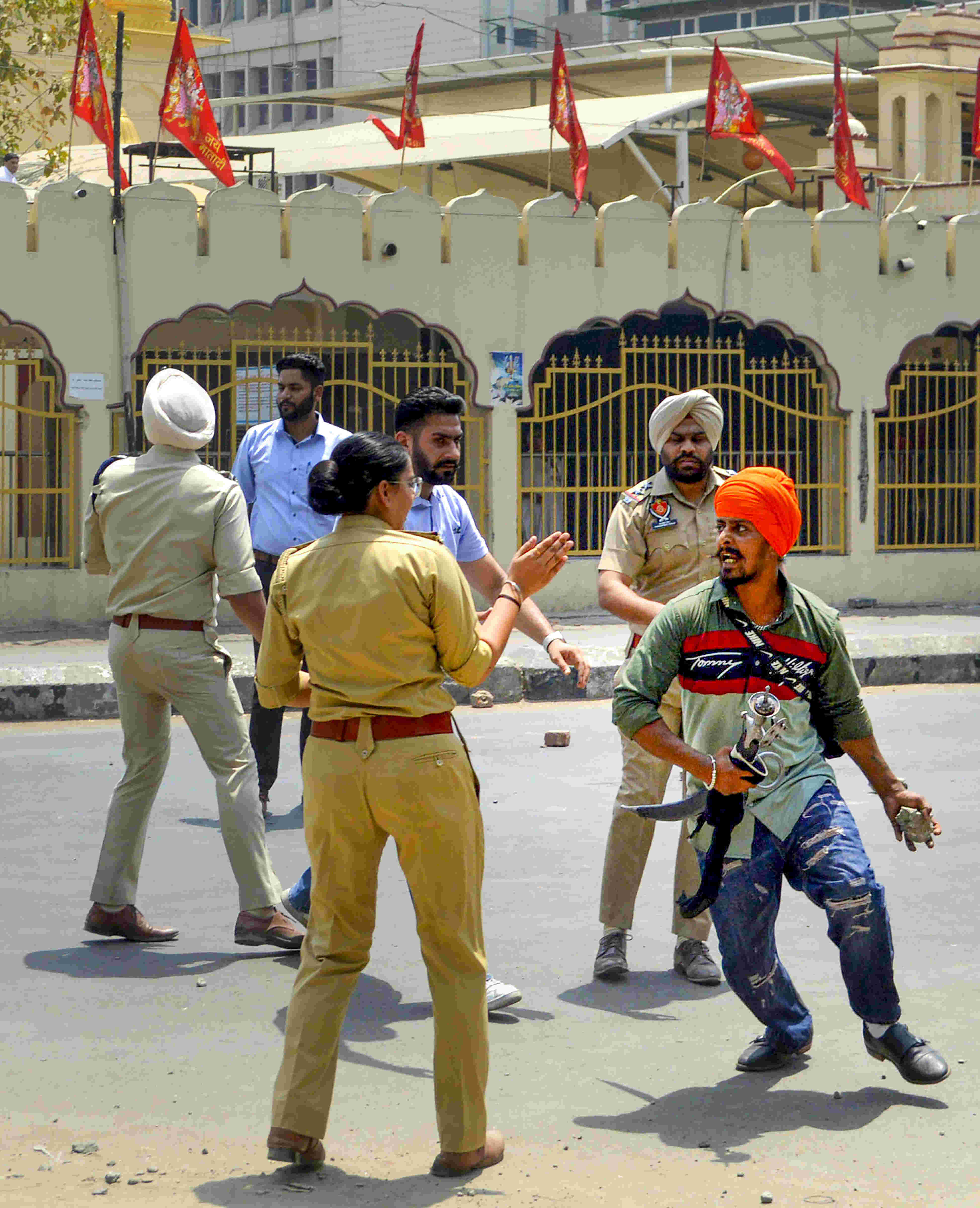 Patiala witnesses group clash over anti-Khalistan march, cops fire in air Patiala witnesses group clash over anti-Khalistan march, cops fire in air