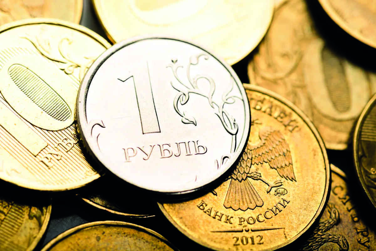 Rouble hovers near five-year highs vs euro