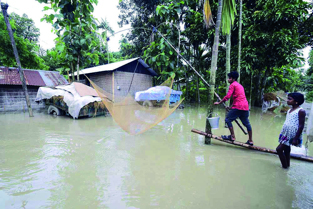 Assams flood situation improves as water recedes Assams flood situation improves as water recedes