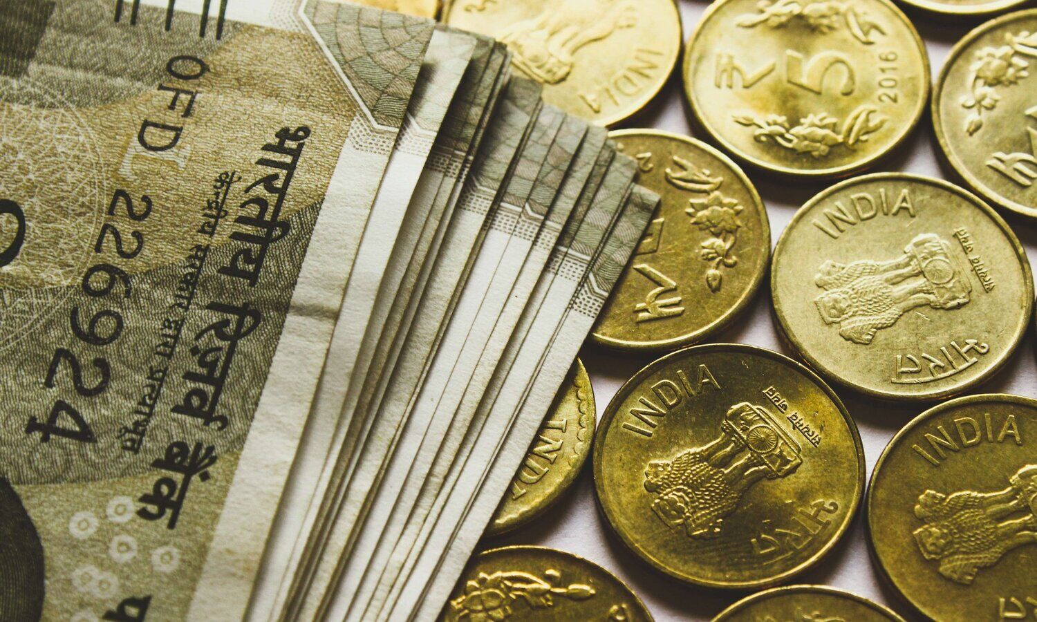 Rupee slips 5 paise to 77.71 against US dollar in early trade