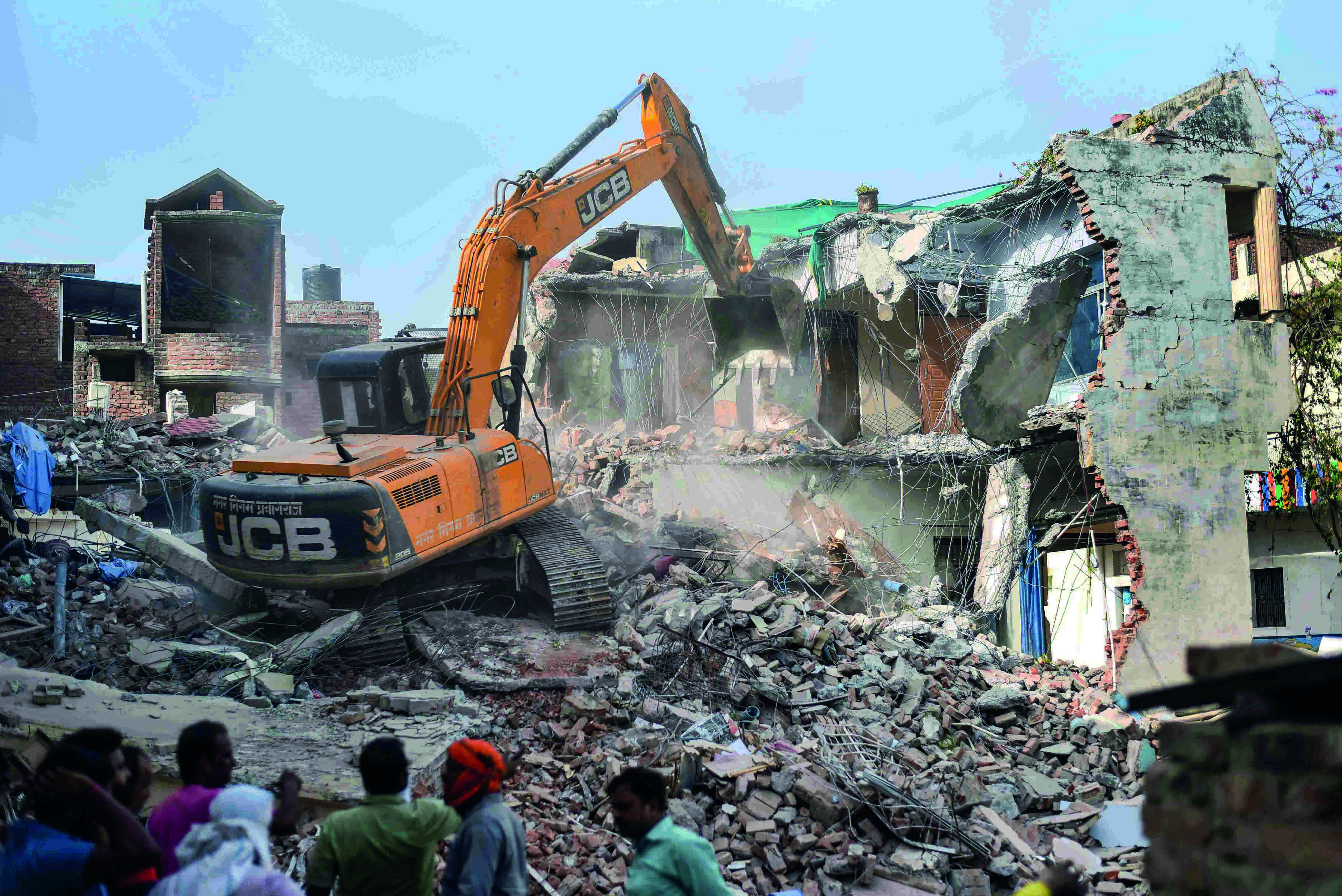 Authorities mull action against others after bulldozing home of violence mastermind
