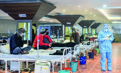 As COVID-19 cases surge, city ramps up genome sequencing As COVID-19 cases surge, city ramps up genome sequencing